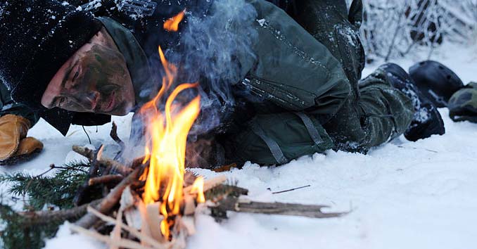 Starting a fire to prevent hypothermia