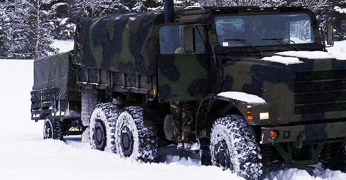 Big Truck driving in the Snow