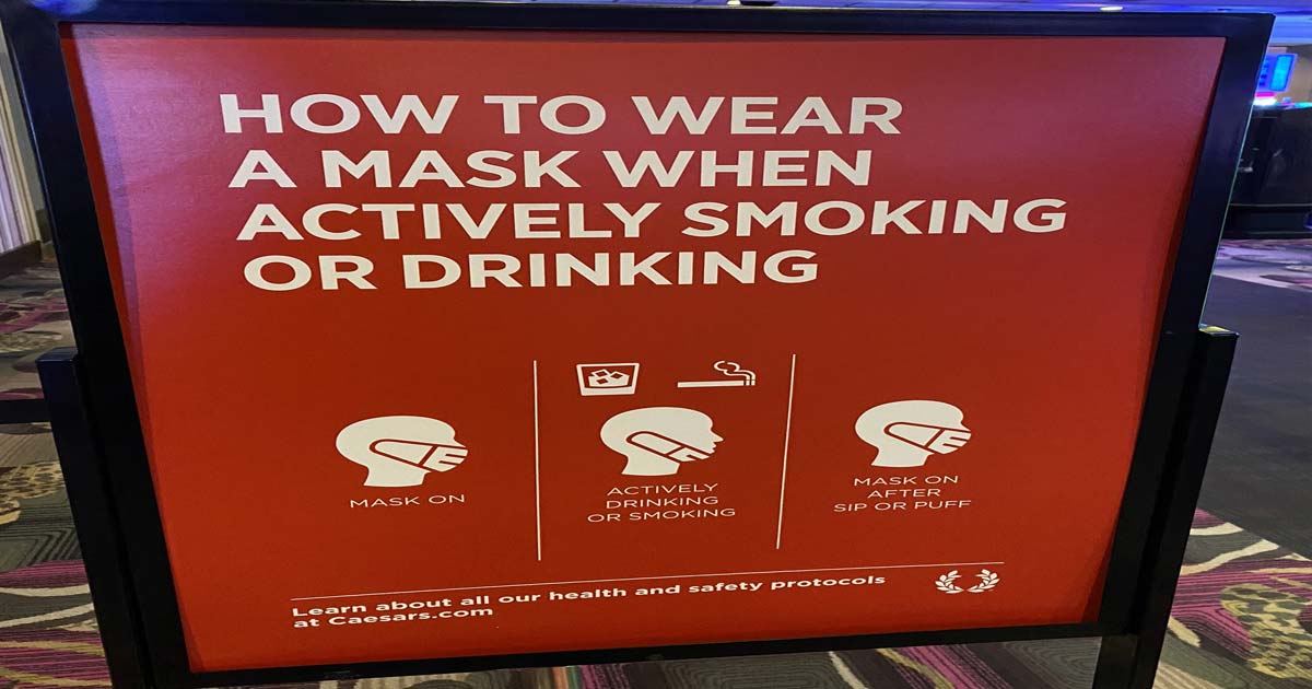 wearing mask while drinking sign