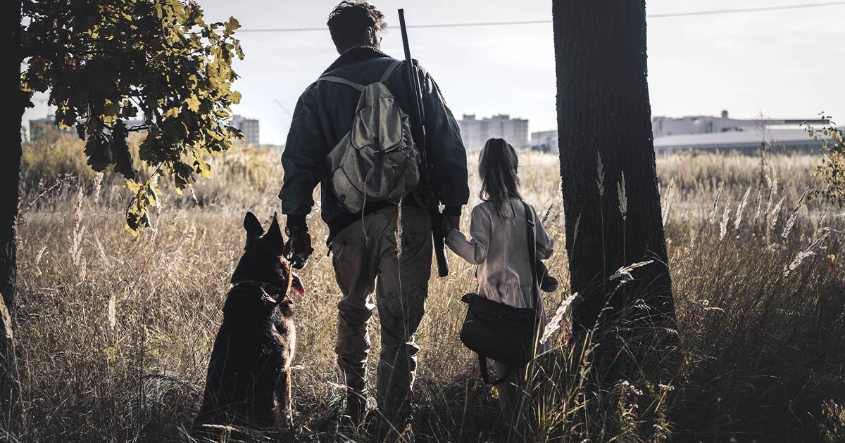 Guy with a bug out bag bugging out with child and dog