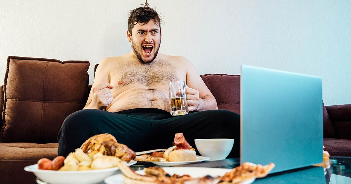 fat guy with beer on the couch