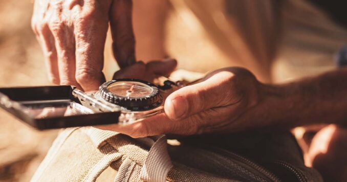 Using a compass and a map to navigate