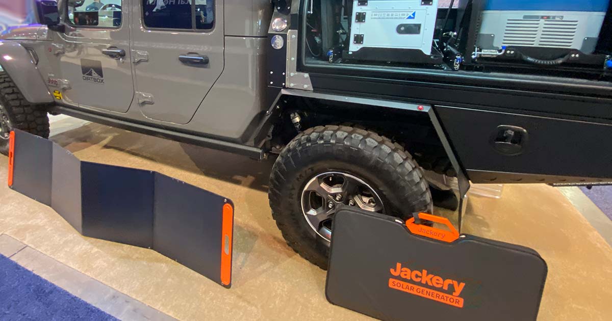 Jackery Solar Panels next to an Offroad vehicle